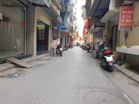 BÁN NHÀ MẶT NGÕ Ô TÔ ĐƯỜNG THÁI THỊNH. 43M2 - 7 TẦNG. 11 PHÒNG CHO THUÊ.