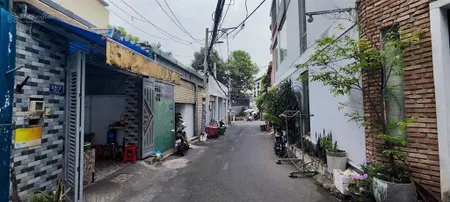Bán nhà 1 trệt 1 lầu sân thượng hẻm xe hơi đường 385, cạnh trường tài chính marketing