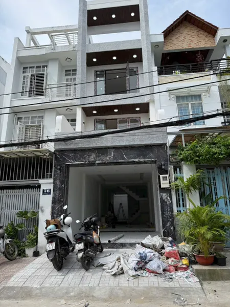 Bán nhà MT đường số 51 p tân quy . dt 4x20m 1 trệt 3 lầu , thang máy , nhà mới đẹp .sh
