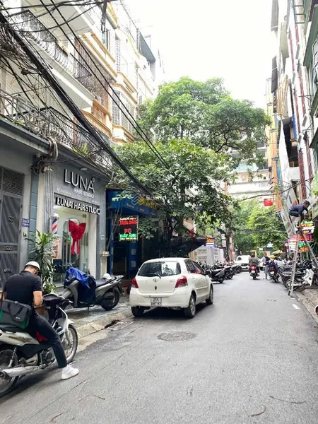Tôn đức thắng thịnh hào đống đa dt 75m2 x mt 5m giá 19,5 tỷ oto tránh vào nhà xây ccmn và vp