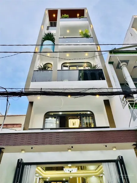 Nhà mới xây, hiện đại, full nội thất, 3 lầu, có thang máy (4x14m) hẻm xe hơi lê văn thọ