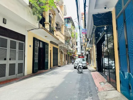 BÁN TÒA NHÀ CCMN ĐƯỜNG HOÀNG VĂN THÁI. 70M2 - 7 TẦNG. THANG MÁY. 16 PHÒNG KK.