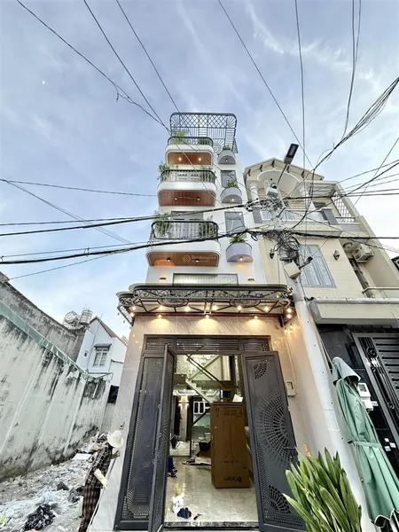 Nhà phố 4m x 15m. xây 4 tầng full nội thất hẻm nhựa xe hơi đường thới an 20