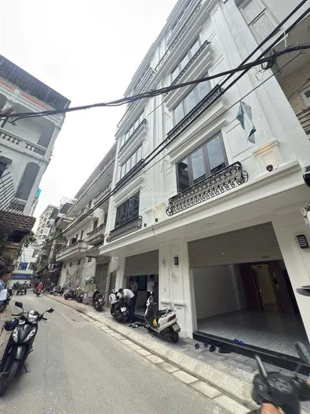 Mặt phố đội nhân, ba đình 40m mặt tiền 4,5m 7 tầng thang máy lô góc vỉa hè , ô tô tránh, kd