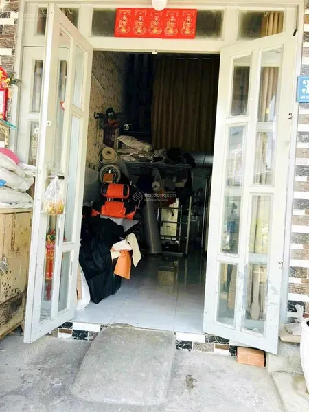 Tôi bán nhà 25 m2, xe hơi đậu trước nhà, tuyệt đẹp, quận 7. giá 850 triệu