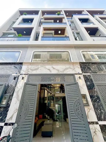 Nhà mới đường chiến lược bình tân 4mx18m hẻm 8m xây 5 lầu 6pn có thang máy giá chốt tốt